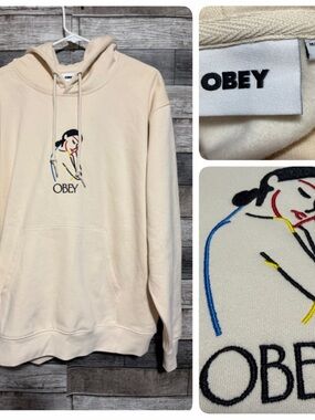 Obey Embroidered Woman Logo Hoodie Men’s L Cream Pullover Fleece